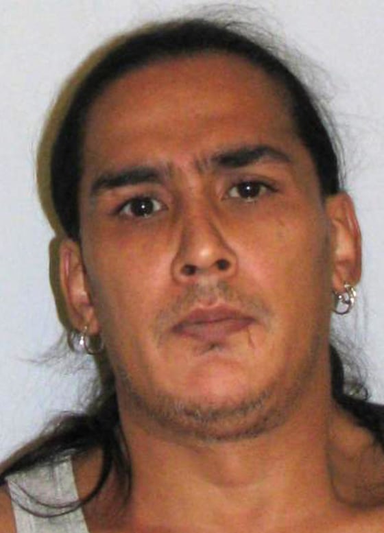 Michael Mendez, here in an undated photo provided by the New Jersey State Police, allegedly kept his 44-year-old girlfriend captive in a padlocked room. Police found the woman during a drug raid.